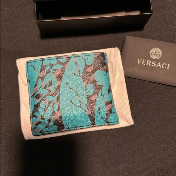 Versace blue multicolor leather La Greca bifold wallet.